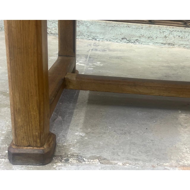 Long table made in France in the 1800's, previously likely used as a sewing table. The top is a type of pine, the bottom...