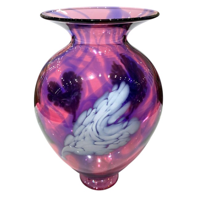 Beautiful hand-blown art glass vase by California glass artist David L. Lindsay, dated 2000. The vase features luminous...