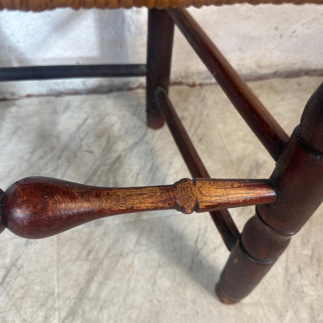 This is a lovely example of an antique country side chair, likely from the late 18th to early 19th century, with the...