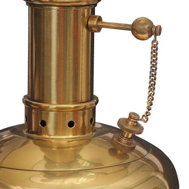 Brass and wood are the components of this rare vintage Gio Ponti table lamp. A piece with a classic and handsome style, a...