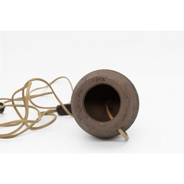 This table lamp with a height of 20.5 cm is made from authentic Laholm ceramic, produced in the historic pottery town of...