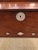 Impressive large box gorgeously hand crafted out of aged mahogany and mother of pearl decoration. There are crystal knobs...