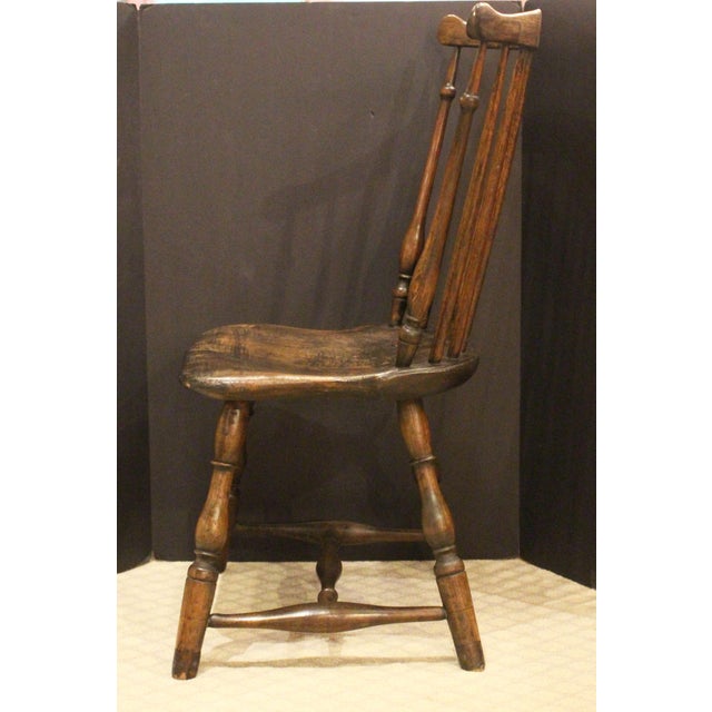 Early 19th century American small fan back Windsor Side Chair. Walnut with old black worn stain. Apparently once a rocker,...