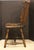 Early 19th century American small fan back Windsor Side Chair. Walnut with old black worn stain. Apparently once a rocker,...