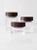 A sophisticated set of three vintage cut glass jars with beautifully detailed leather lids. The graduated vessels feature...
