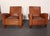 Handsome pair of late 1930s/early 1940s French club chairs sourced in the south of France in supple sheep hide leather...