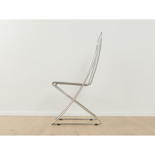 Postmodern cross swing based on the first design from the 1950s by Till Behrens for Schlubach. High-quality frame and...