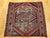 This near-square antique Turkish village rug is a striking example of Anatolian craftsmanship, showcasing a bold geometric...