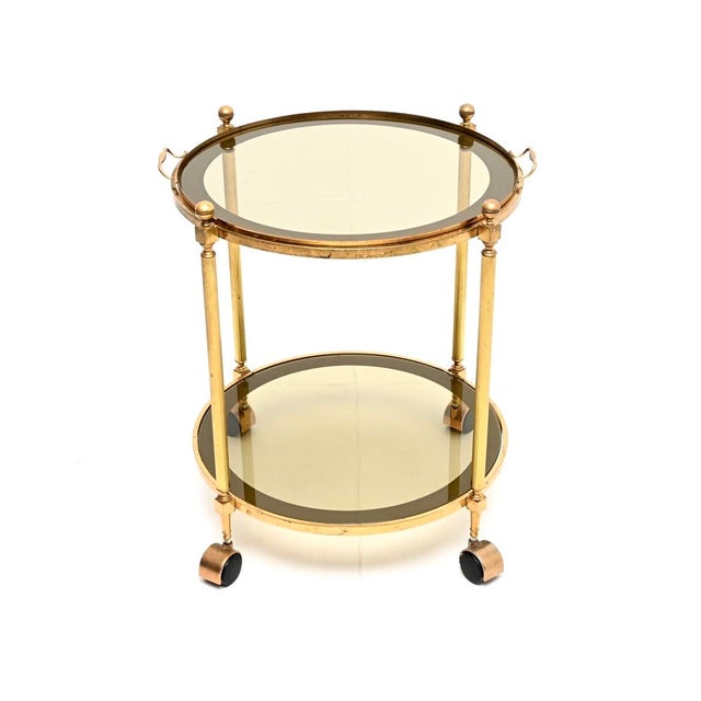 A beautiful vintage French brass drinks trolley, dating from around the 1970’s. It is of amazing quality, the circular...