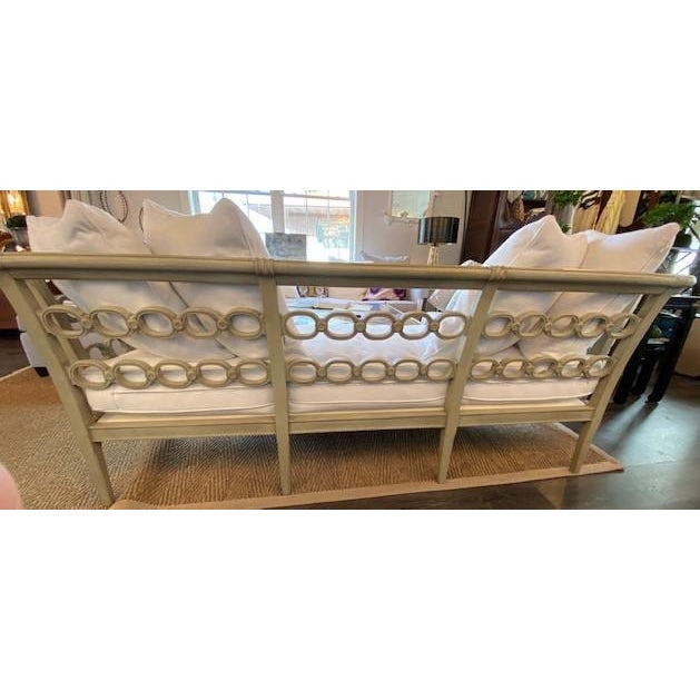 A charming Vintage Carved Sofa with a distressed finish in antique grey over a cream base. This sofa is has a beautiful...