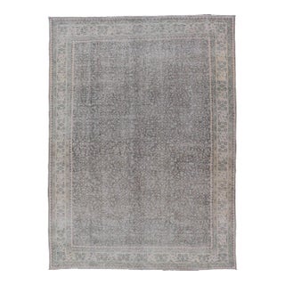 Mid 20th Century Vintage Hand-Knotted Distressed Turkish Rug in Wool With All-Over Floral Pattern For Sale