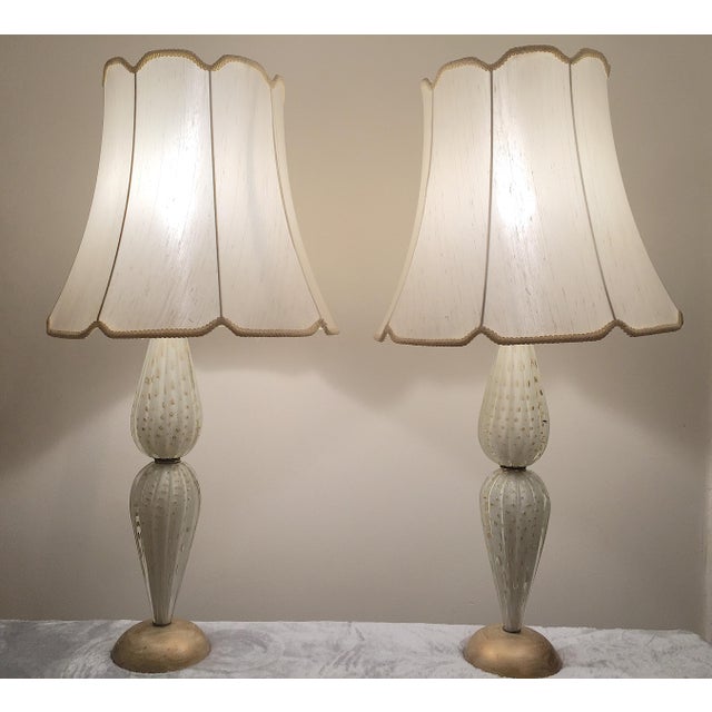Circa 1940s-1950s, these highly collectible, highly desirable lamps are exquisitely designed, and feature tall glass...