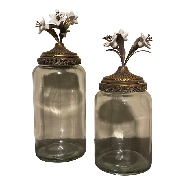 Glass Canisters With Gold and White Porcelain Flowers - Set of 2 For Sale