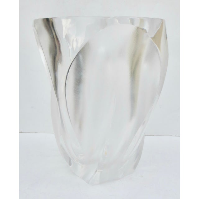 Ingrid Crystal Vase by Lalique. Vintage 1960s-70s and designed by Marc Lalique. Assymetrical form with clear wall and...