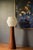 Mid century modern tall accent table lamp circa 1960's. Features a sculptural walnut base displaying natural warm wood...