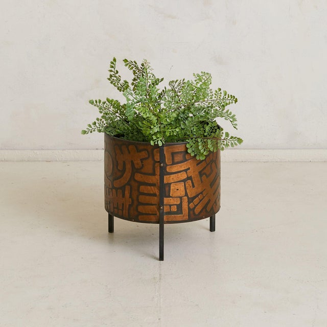 A sculptural planter attributed to the Turin workshop of Victor Cerrato, dating to the 1960s. The cylindrical form is clad...