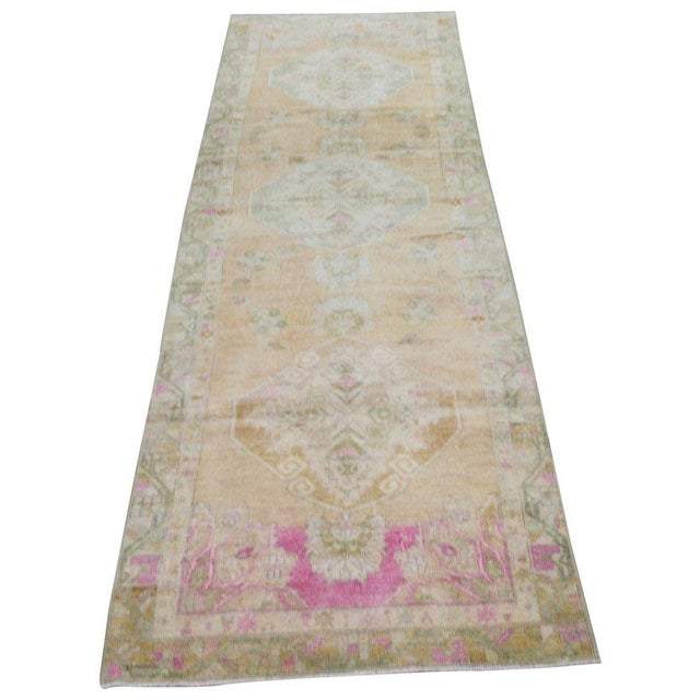 Hand-knotted with care using traditional rug-making techniques, this wool rug blends timeless craftsmanship with a modern...