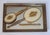Vintage brass vanity set. The set includes mirrored tray, brush, comb, and hand mirror. Some light oxidation, age spots on...