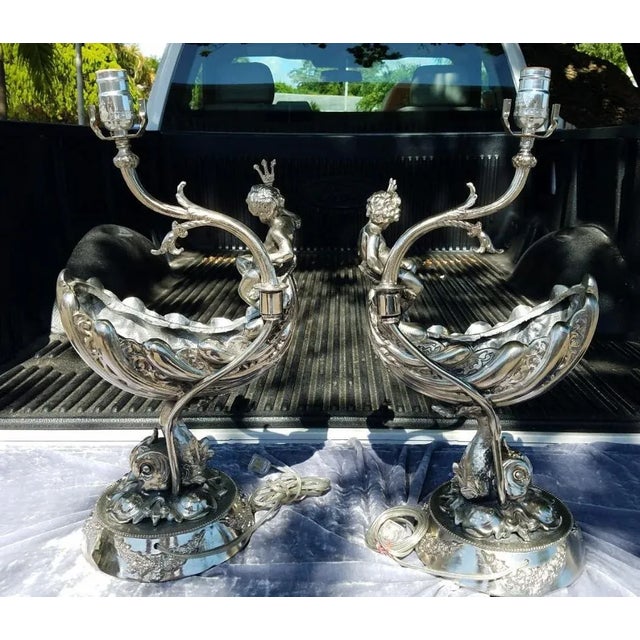 Impressive Pair of Nautical Lamps of Putti W Triton on Nautilus Shell and Dolphin sold as found in vintage condition...