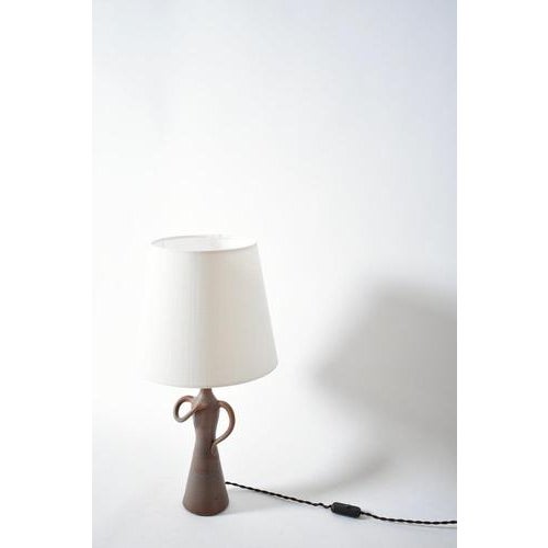 Anthropomorphic ceramic lamp, 1950s. Height: 31 cm - 12.2 in Length: 13 cm - 5.12 in Width: 10 cm - 3.94 in Height with...