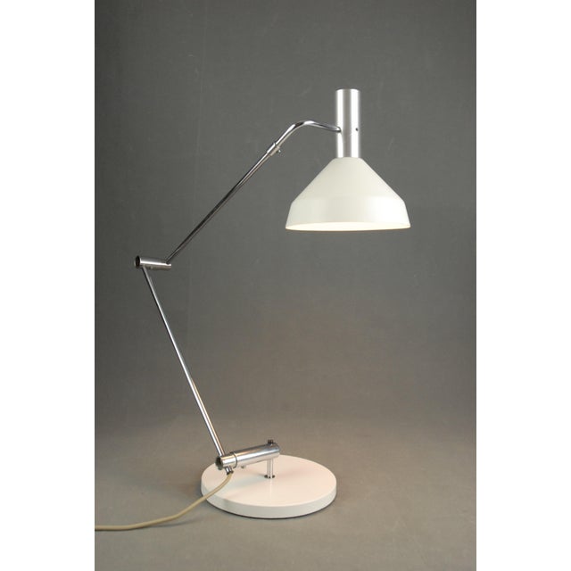 A rare 1960s type 60 t table lamp designed by swiss designers rico baltensweiler and rosmarie baltensweiler for...