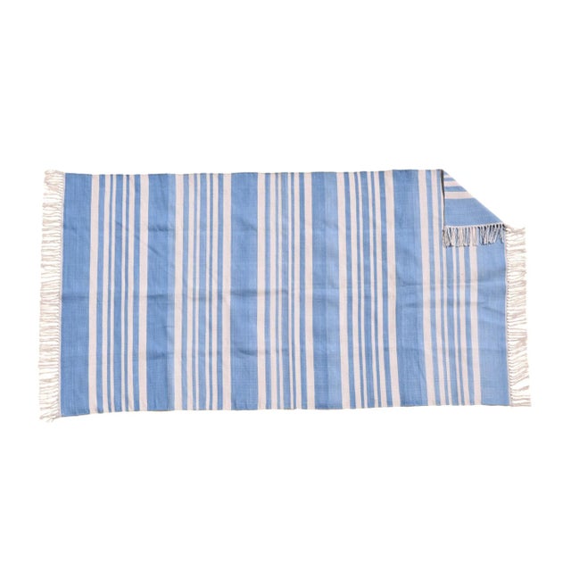 Presenting our Regal Dalia Collection! Made from naturally dyed 100% cotton yarn, these dhurrie rugs have been handwoven...