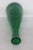 This gorgeous Bottle Decanter is made of crackle glass, and is in good condition. This beautiful piece has a lovely green...