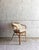 This delicate mid-century rattan chair dates from the 1960s and was made in Germany. Very good vintage condition, with...