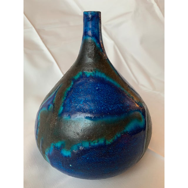 Offered is a rare Italian pottery vase by famous artist Guido Gambone. This beautiful vase features a lava glaze with...