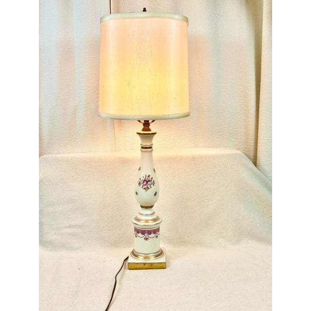 Lovely vintage lamp. Comes with the lamp shade. Floral design in pinks and purples. Gold detailing. Perfect to use for...