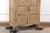A French painted wood buffet deux-corps cabinet (armoire à deux corps), richly exhibiting handcrafted detail, from the...