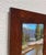 Mountain Waters captures a serene landscape where a tranquil stream meanders through a lush setting, framed by tall...