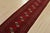 An authentic vintage tribal Turkmen runner, hand-knotted with fine wool and natural dyes. This nomadic rug features a row...