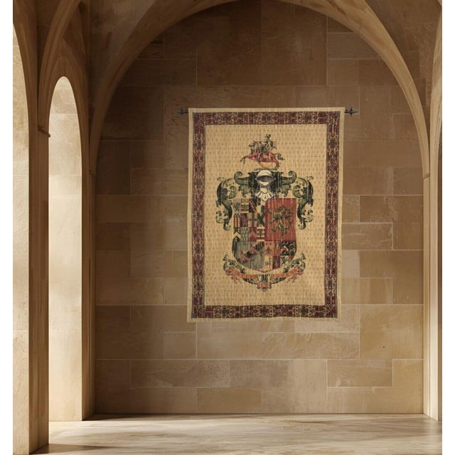 This tapestry features the armorial bearing of a noble knight of the sixteenth century. The chivalrous composition...
