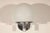 Lightolier sconce with one up light. Matching ceiling fixture also available, sold separately.