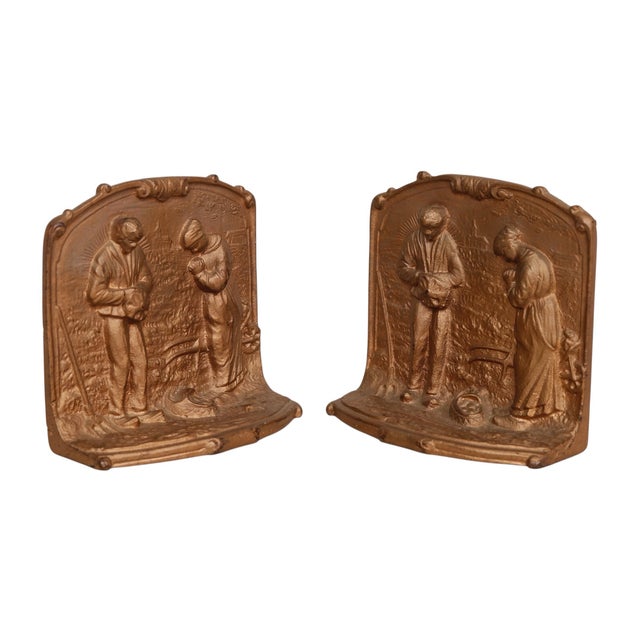 A pair of Art Deco period bronze bookends depicting a scene from ‘The Angelus’, an oil painting by French painter Jean...