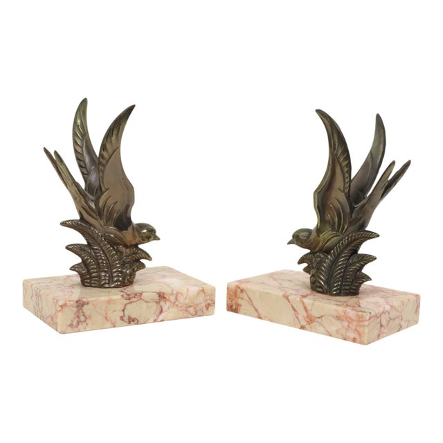 Beautiful vintage bookends, a pair of Art Deco bird or swallow bookends with a beige and red veined marble base; the birds...