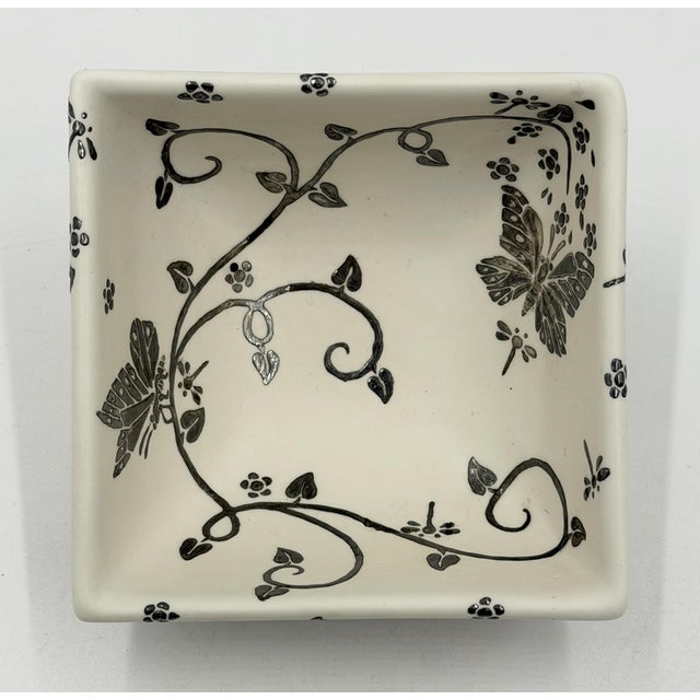 An exquisite handcrafted porcelain and pure silver square serving bowl designed by celebrated Mexican artist Emilia...