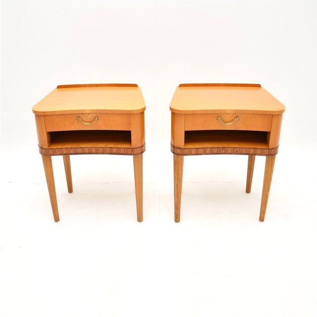 A smart and stylish pair of Swedish vintage Elm bedside cabinets. They were recently imported from Sweden, made by...