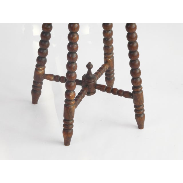 Antique rectangular bobbin table made out of oak wood with a beautiful floral carving on the top. Made in the early 1900's...
