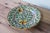 This decorative ceramic plate comes from the renowned Ars Deruta factory in Italy. It is distinguished by its hand-painted...