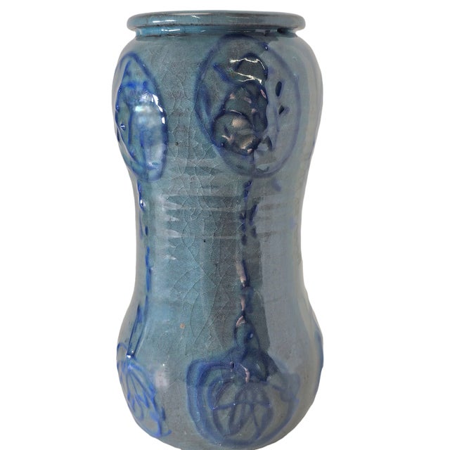 This vintage studio art pottery vase captures the essence of early 1960's brutalist pottery. It features green glaze base...