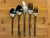 Jorgen Dahlerup and Gert Holbek "Prism" Stainless Flatware Set. Set includes 42 pieces, 5 pieces per place setting plus 2...