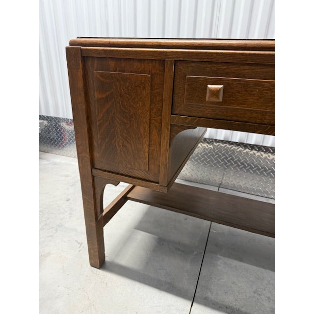 Auglaize Furniture Company library desk circa 1920s. Made from quartersawn "tiger" oak with concealed bookcases on the...