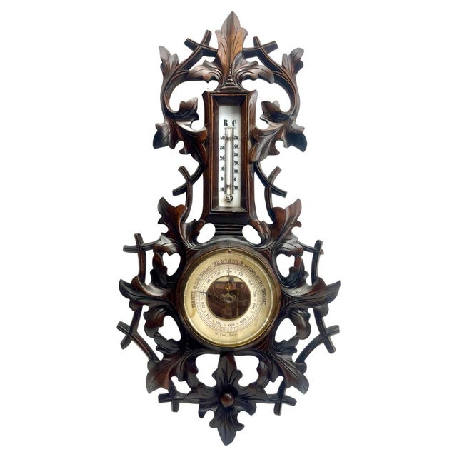 Wall-mounted weather station in carved walnut made in Liege Belgium by G.Tart. High quality mechanism with jeweled...