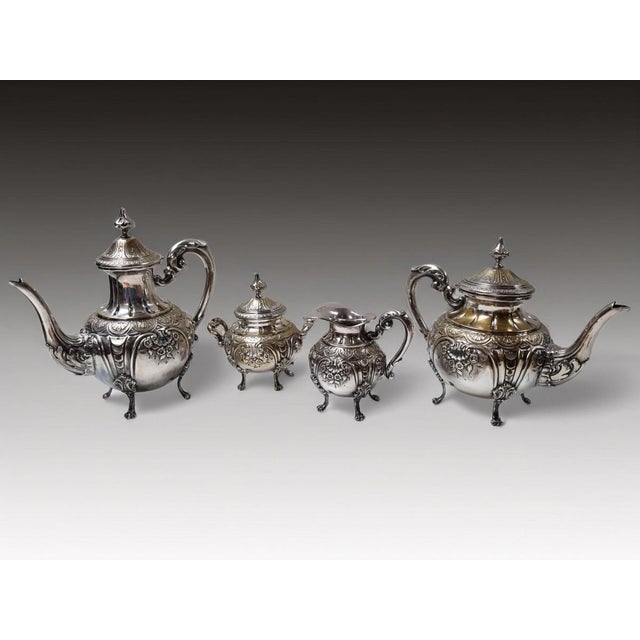 Antique silver-plated 4 piece coffee and tea set, the late 19th century in the rococo baroque style possibly a british,...