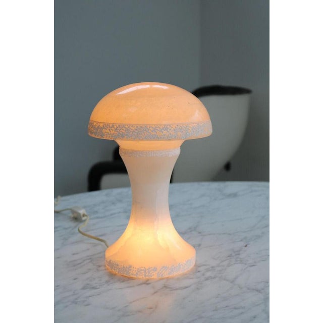 The umbrella and foot are illuminated. Rare Mushroom Lamps Model. Alabaster Mushroom table lamp. Probably Italy 1960s....