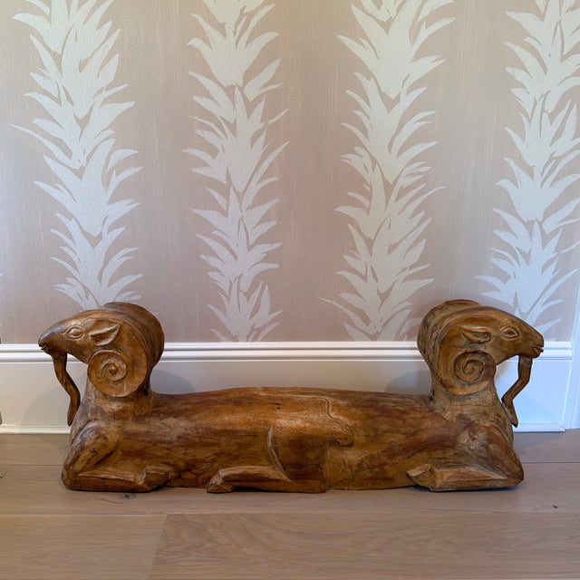 Impressive vintage hand carved wooden double headed ram sculpture. Great presence and patina. A fantastic conversation...