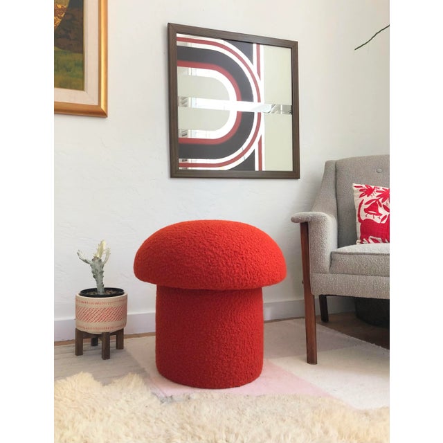A handmade mushroom shaped ottoman, upholstered in a red-orange colored curly boucle fabric. Perfect for using as a...