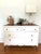White painted american farmhouse dresser. The legs have been left in the matching wood color. So has the top. Inside the...